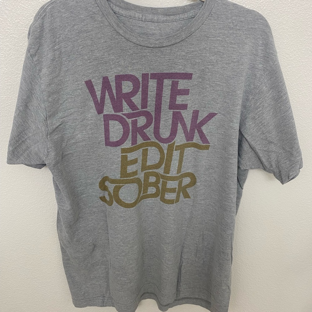 Gray Graphic T-Shirt with Purple and Gold Text